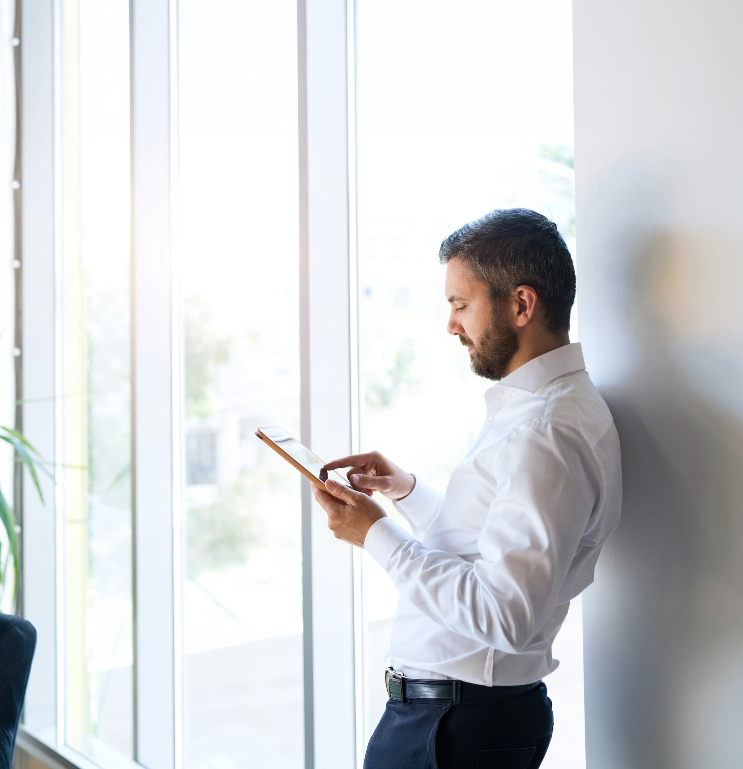 Office worker using a mobile device